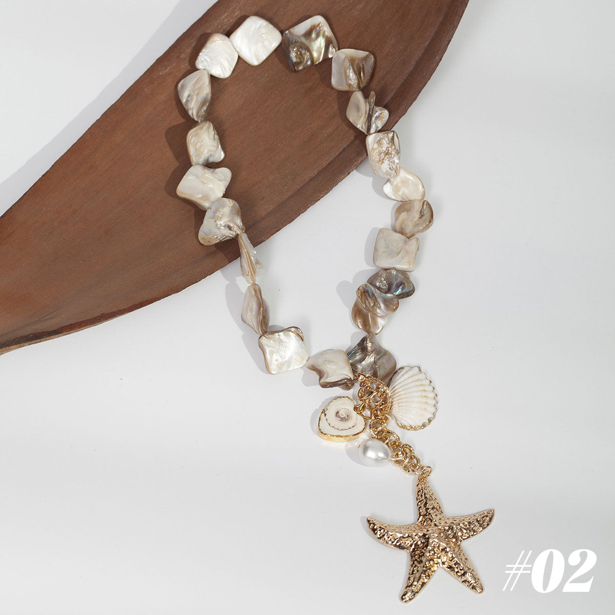 🌊Halsband med snäckor och sjöstjärnor i havsstil🐚