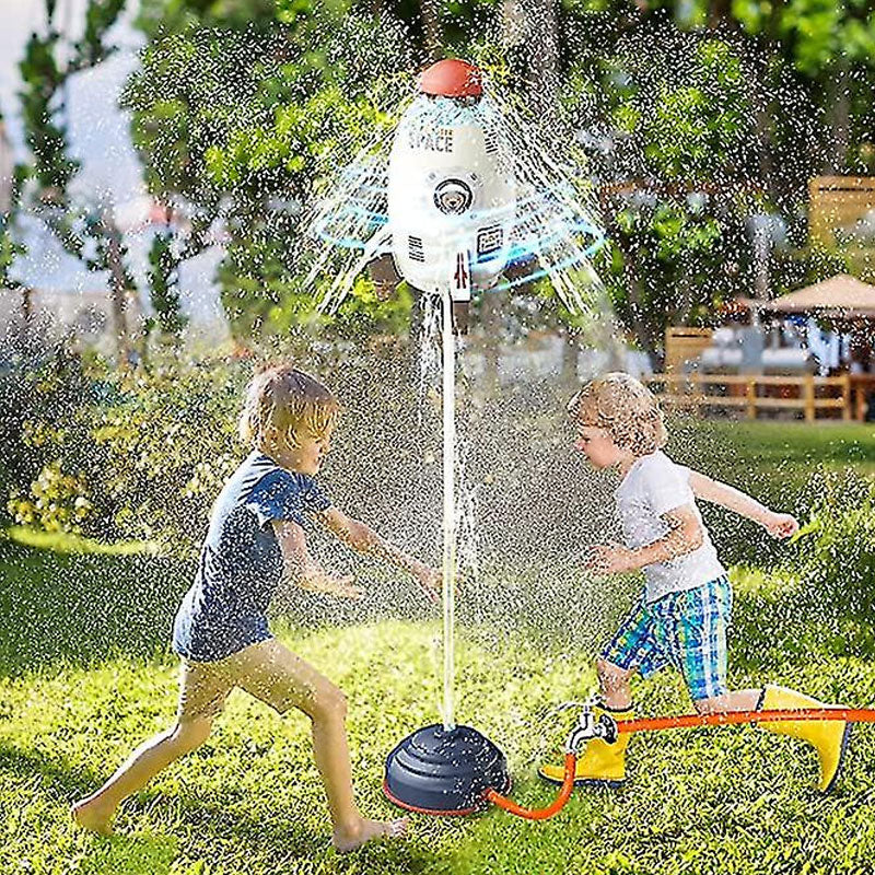 Barnens roterande raketvattensprayleksak