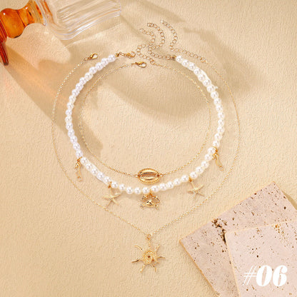 🌊Halsband med snäckor och sjöstjärnor i havsstil🐚