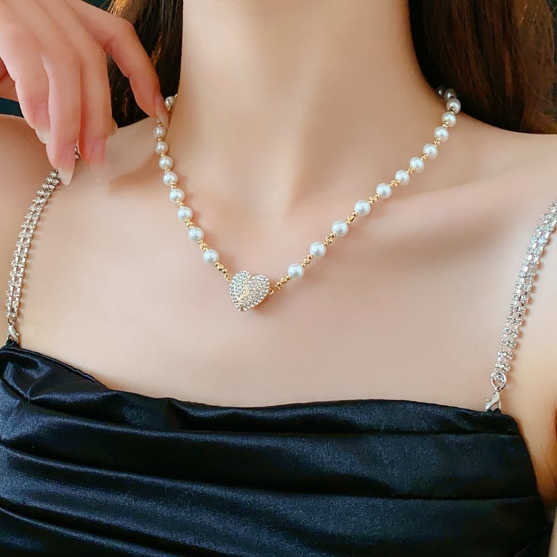 💖 Den perfekta presenten för kärlek och elegans - Magnetiskt pärlhalsband med hjärta 💖