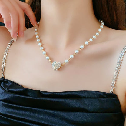 💖 Den perfekta presenten för kärlek och elegans - Magnetiskt pärlhalsband med hjärta 💖
